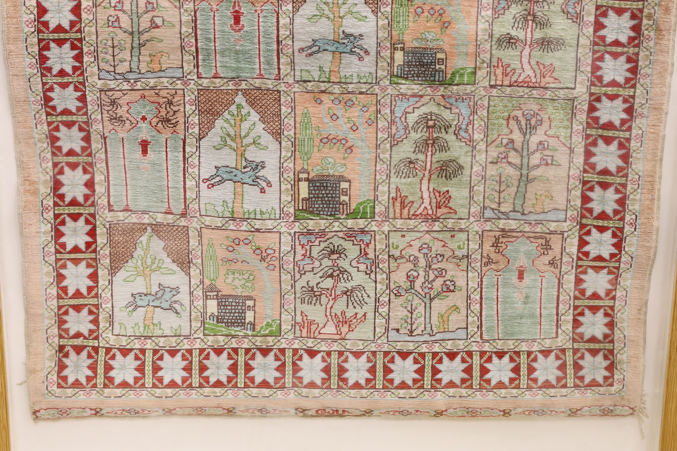 An Eastern framed silk rug depicting trees amimals and buildings, 86 cms high x 67cms wide - Image 4 of 4