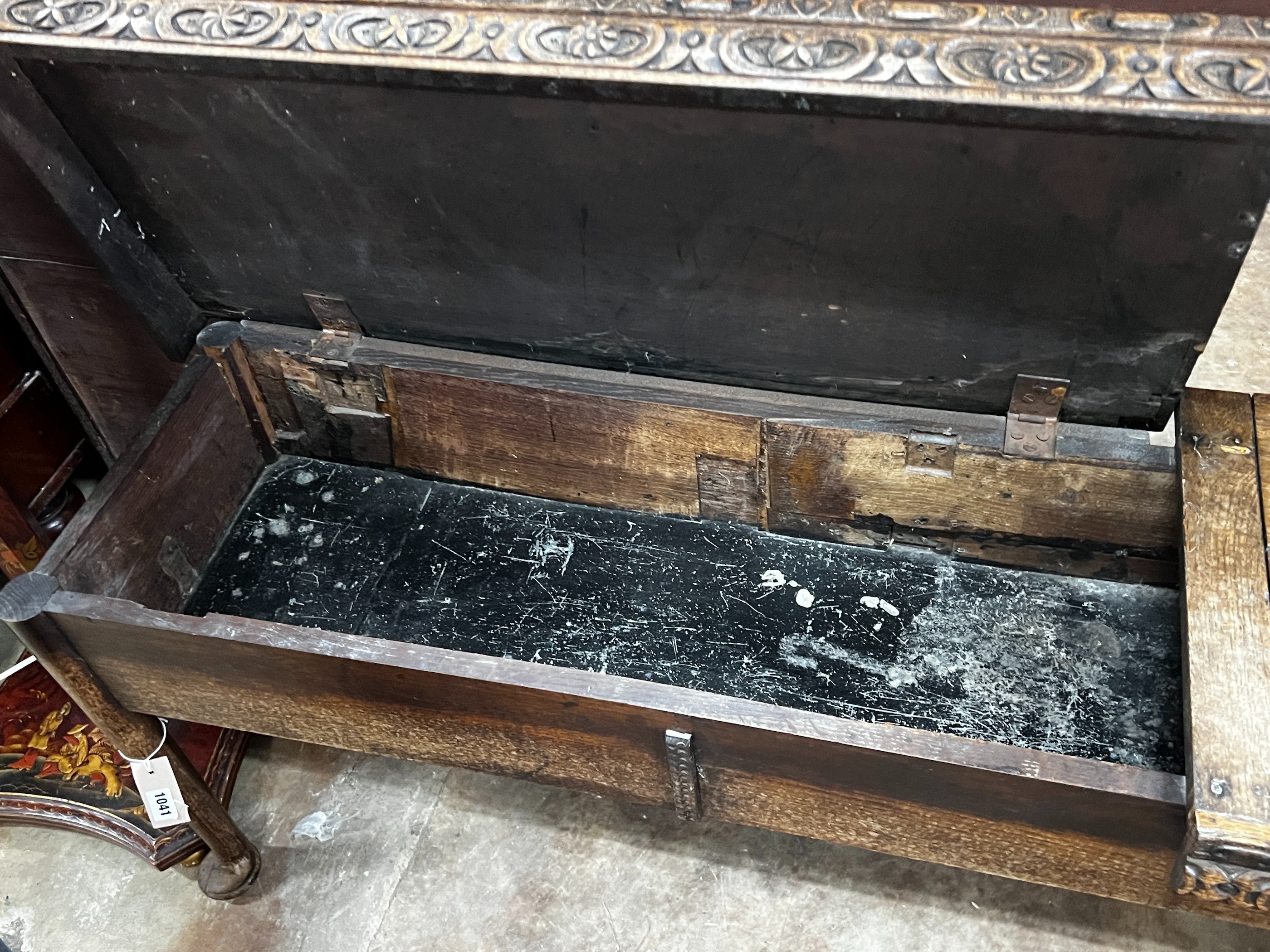 An 18th century and later carved oak hall bench with twin hinged box seat, width 183cm, depth - Image 4 of 4