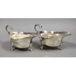 A pair of George V silver oval sauceboats, by Wilson & Gill, London, 1935/6, 15.9oz.