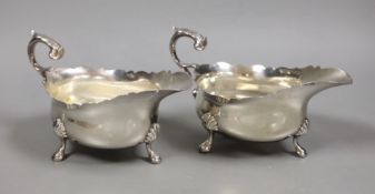 A pair of George V silver oval sauceboats, by Wilson & Gill, London, 1935/6, 15.9oz.