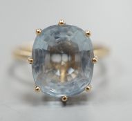 A 9ct gold and oval cut aquamarine set dress ring, size P/Q, gross weight 4.3 grams, the stone