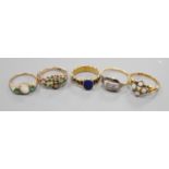 Five assorted early 20th century and later gem set rings, including 15ct white opal and enamel