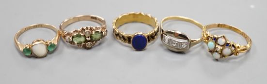 Five assorted early 20th century and later gem set rings, including 15ct white opal and enamel