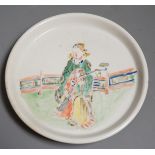 A 19th century Chinese famille verte crackle glaze figural dish, 14.5cm diameter