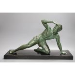 J. De Roncourt, bronze, of a reclining male on black marble stand, 49cms