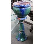 A Staffordshire pottery pedestal jardiniere, 91cms high,