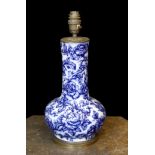 A Victorian mounted blue and white ceramic lamp base, height 38cm