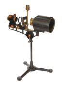 An early 20th century Hatters & Garnett Ltd black lacquered and brass microscope slide projector