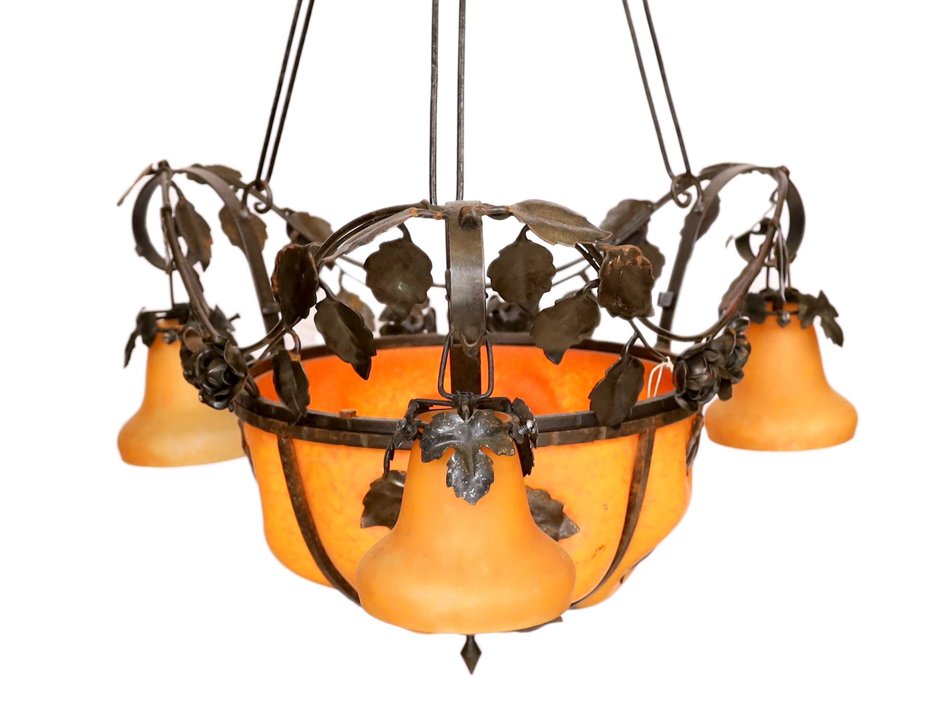 A 1930s French wrought iron and orange marbled glass light fitting decorated with rose motifs,