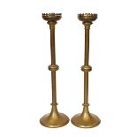 A pair of early 20th century English brass altar sticks, height 61cm
