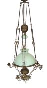 A Victorian brass counterbalanced hanging oil lamp with opaque blue glass shades and six candle