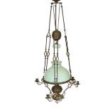 A Victorian brass counterbalanced hanging oil lamp with opaque blue glass shades and six candle