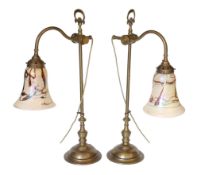 A pair of Edwardian style brass desk lamps with loetz style glass shades, height 61cm***CONDITION