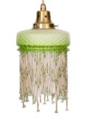 A 1920s French quilted glass light fitting with beaded fringe, height 30cm. width 15cm