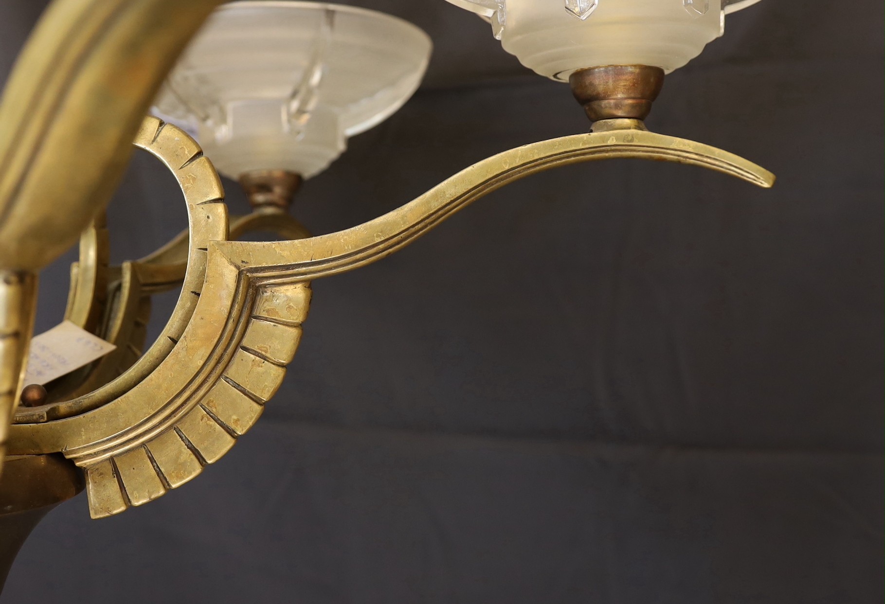 A French Art Deco bronze, hardwood and frosted glass six light chandelier, in the manner of Henri - Image 4 of 4
