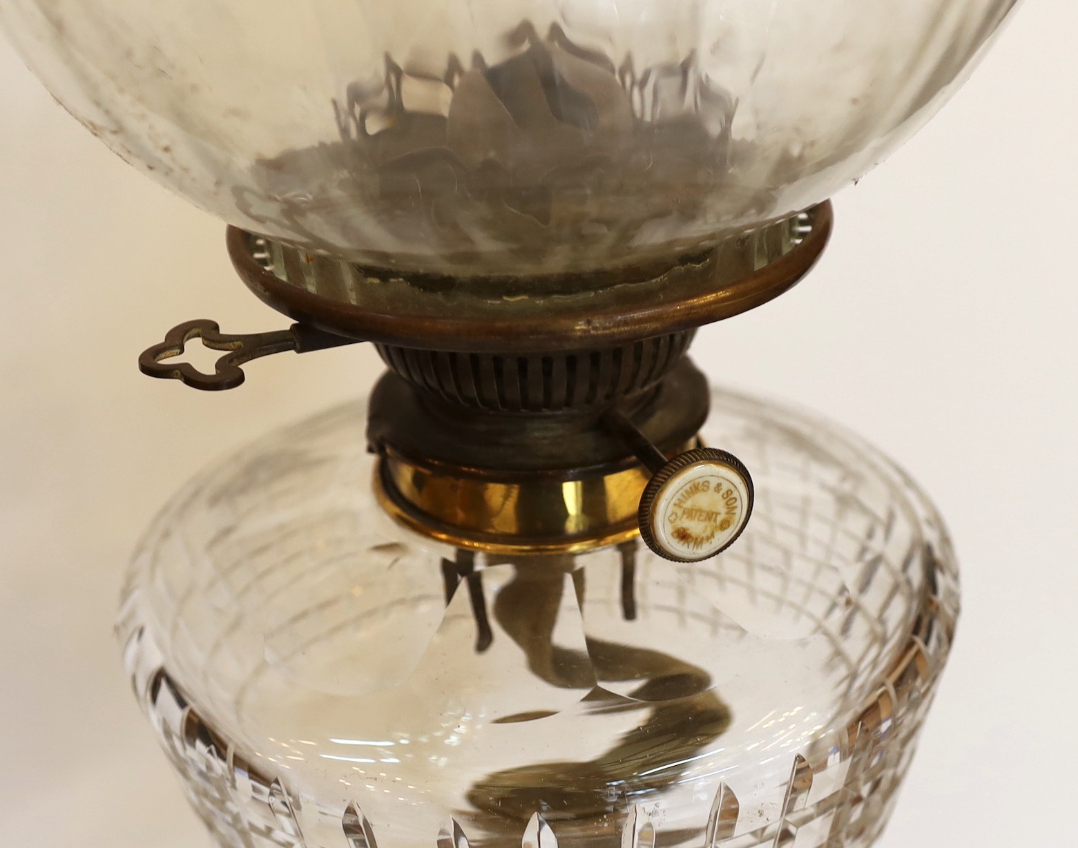 A late Victorian brass and cut glass oil lamp with Hinks and Son mechanism, spiral fluted globe - Image 2 of 3