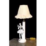A 1950s German ceramic table lamp modelled with a gallant, height 30cm.