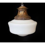 A 1930s English copper ceiling light with opaque glass shade, height 30cm