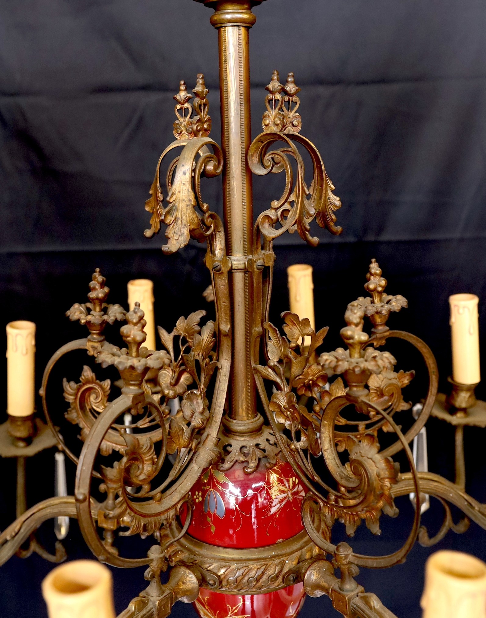 A Victorian bronze ten light gasolier with ornate scrolling foliate frieze and central ceramic stem, - Image 3 of 5