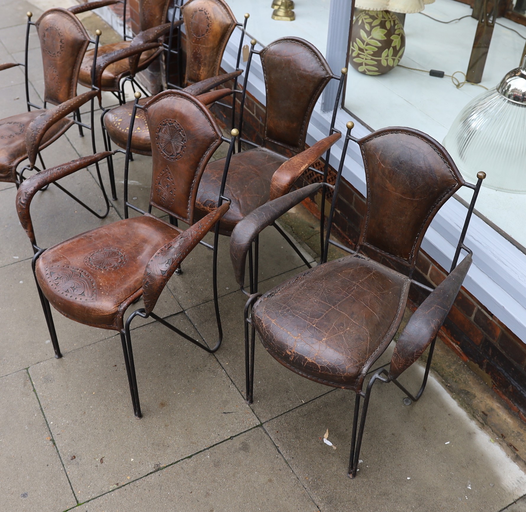 A set of six French wrought iron and brown leather elbow chairs, with brass ball finials, four - Image 2 of 5
