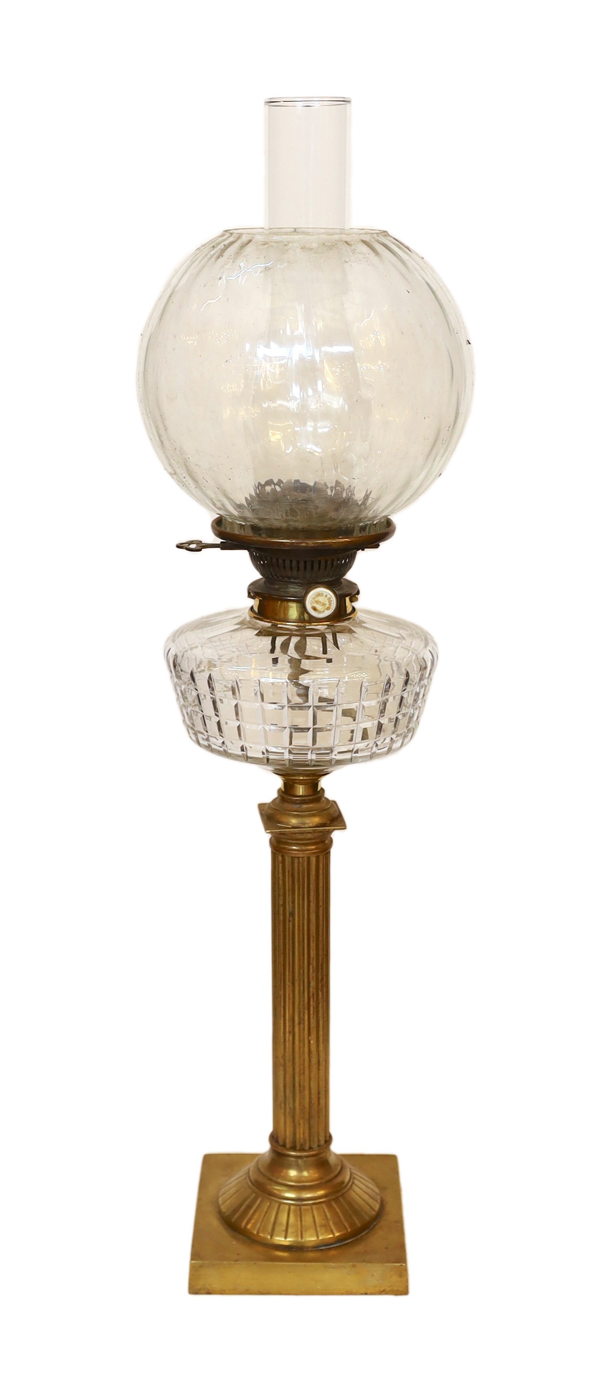 A late Victorian brass and cut glass oil lamp with Hinks and Son mechanism, spiral fluted globe