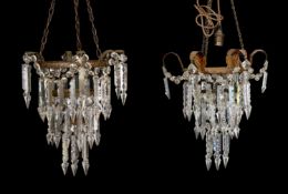 A pair of early 20th century art glass three light lustre light fittings with spear shaped drops,