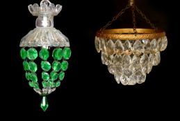 A small 1930s clear and green glass bag shaped light fitting and a brass mounted four tier