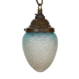 A 1920's English bronzed metal light pendant with blue tinted frosted glass shade, height 22cm***
