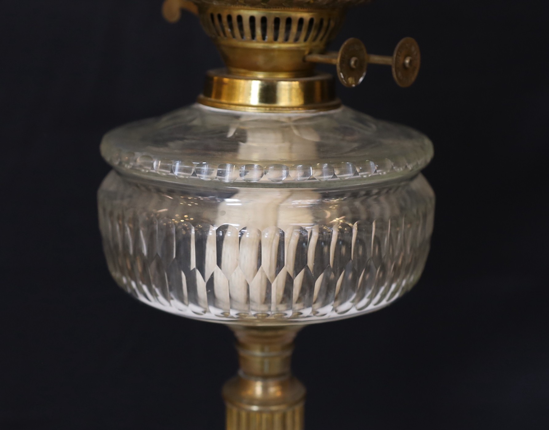 A late Victorian brass oil lamp with cut glass reservoir, duplex mechanism, etched glass globe and - Image 4 of 5