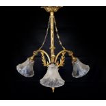 A 20th century French gilt brass three light chandelier with cut glass shades, height 60cm. width