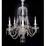 A 1930s Czech cut glass five light chandelier with octagonal bead and bayonet drops, height 100cm.