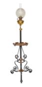 A late Victorian wrought iron brass and copper telescopic oil lamp standard with etched glass