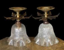 A pair of 1930s English brass ceiling lights of foliate form with crackle glass shades, height