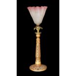 An early 20th century Danish carved and glass bead inset wood lamp base with brass flowerhead