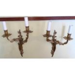 A pair of Louis XVI style ormolu twin branch wall lights, height 42cm, width 28cm