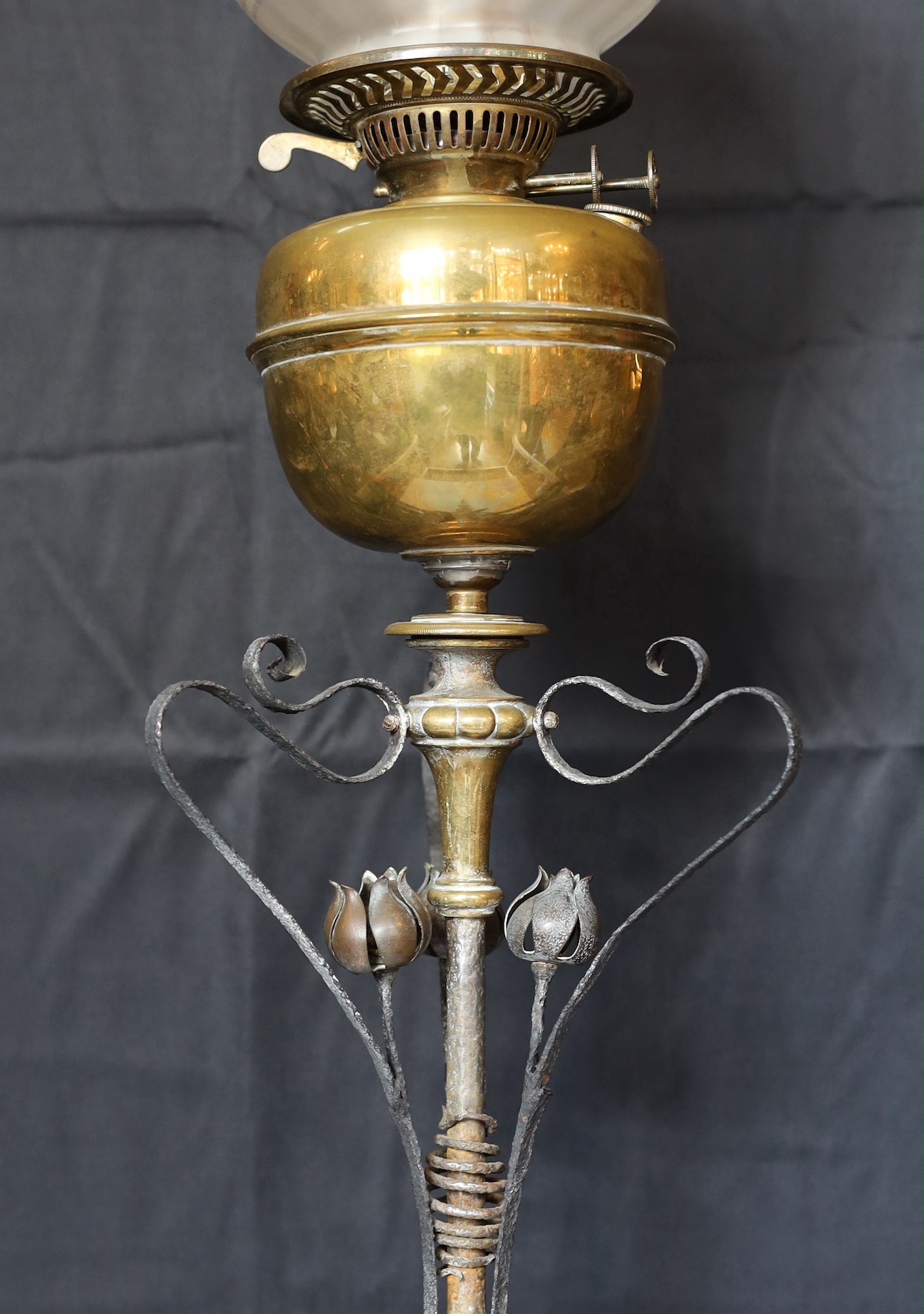A late Victorian Arts and Crafts wrought iron and brass miniature oil lamp standard, in the manner - Image 4 of 5
