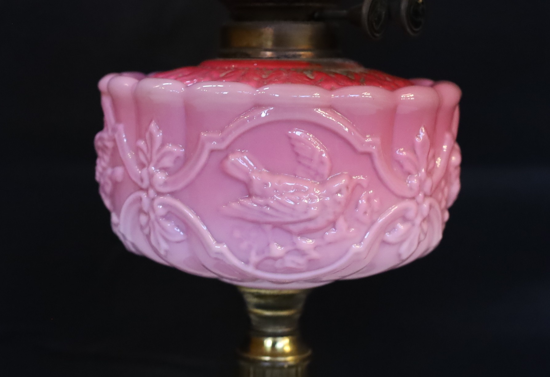 A late Victorian brass and pink opaque glass oil lamp with tinted frosted shade, height overall - Image 3 of 4