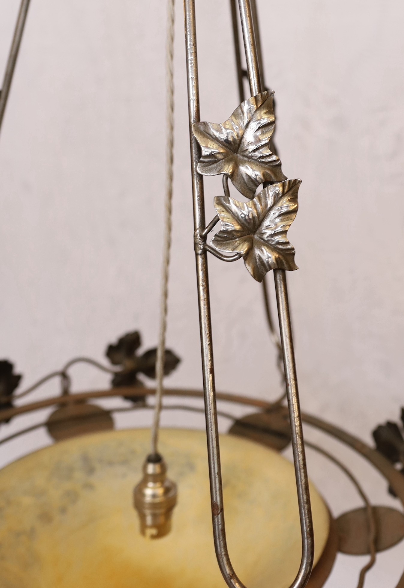 A 1920's-30's French polished wrought iron and marbled glass light fitting decorated with foliate - Image 4 of 5