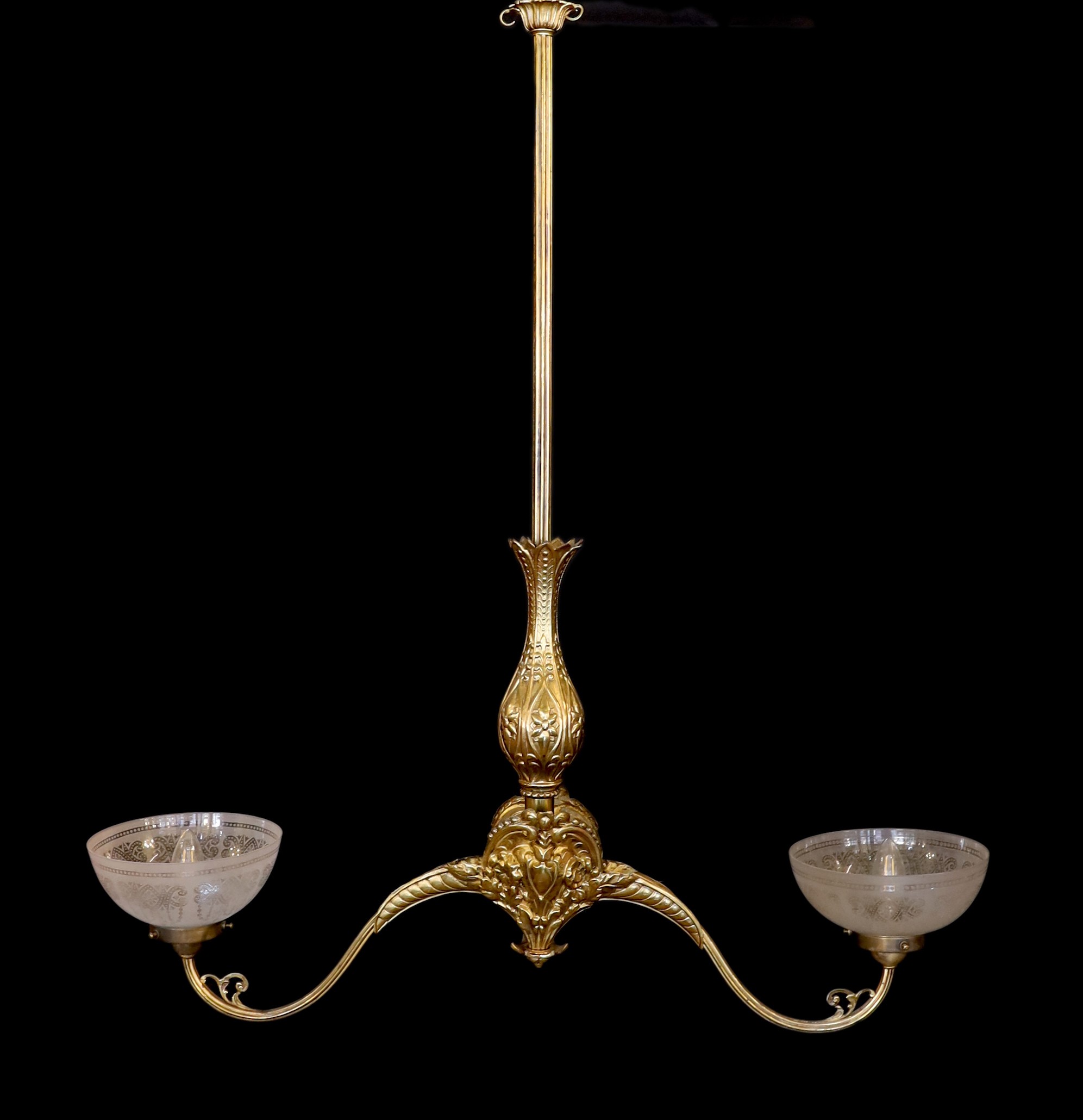 A mid 19th century brass twin branch gasolier with etched crystal glass shades, drop 100cm. width