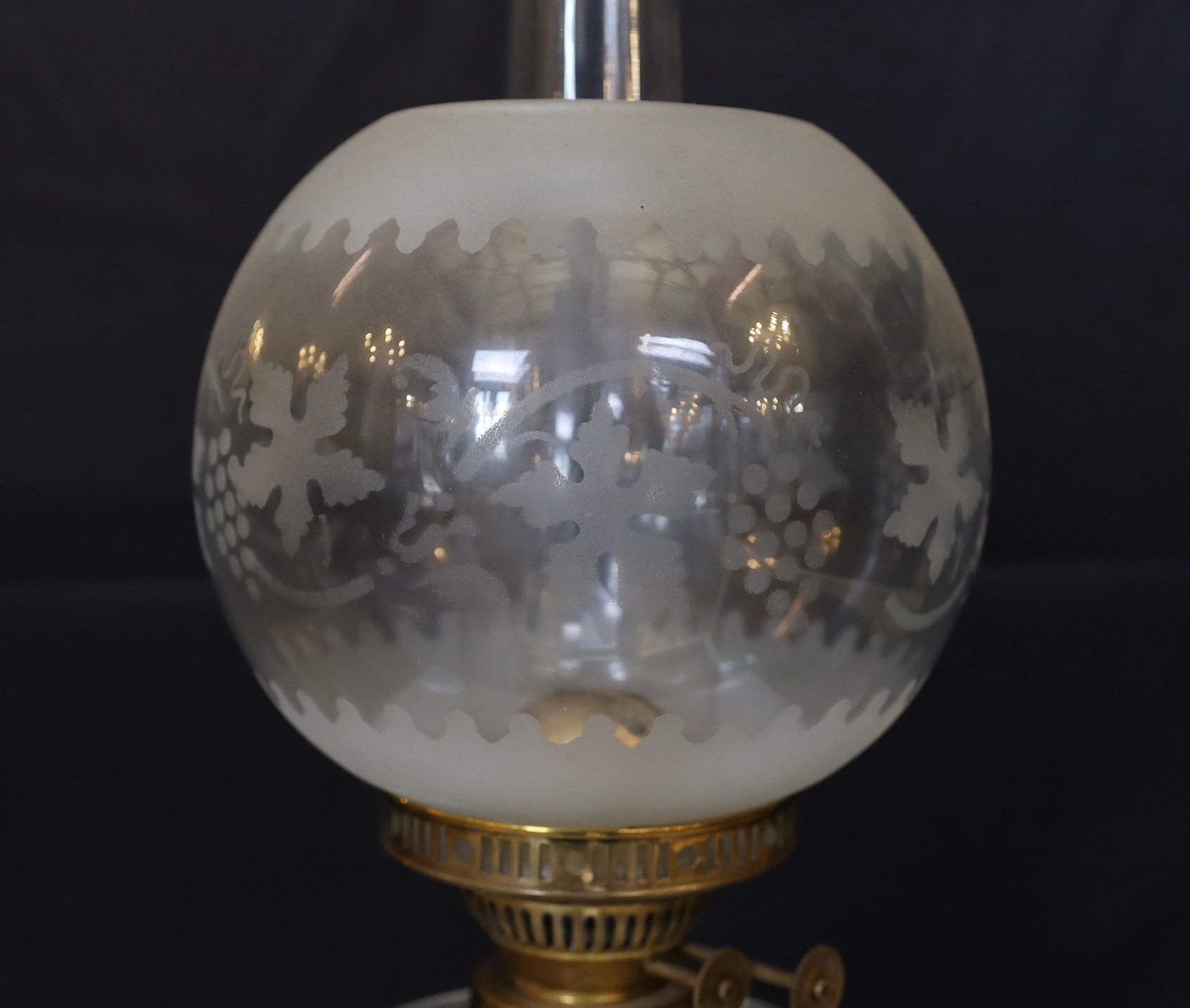 A late Victorian brass oil lamp with cut glass reservoir, duplex mechanism, etched glass globe and - Image 2 of 5