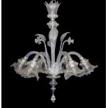 A Venetian clear glass six light chandelier with ornate foliage and flower motifs, height 85cm.