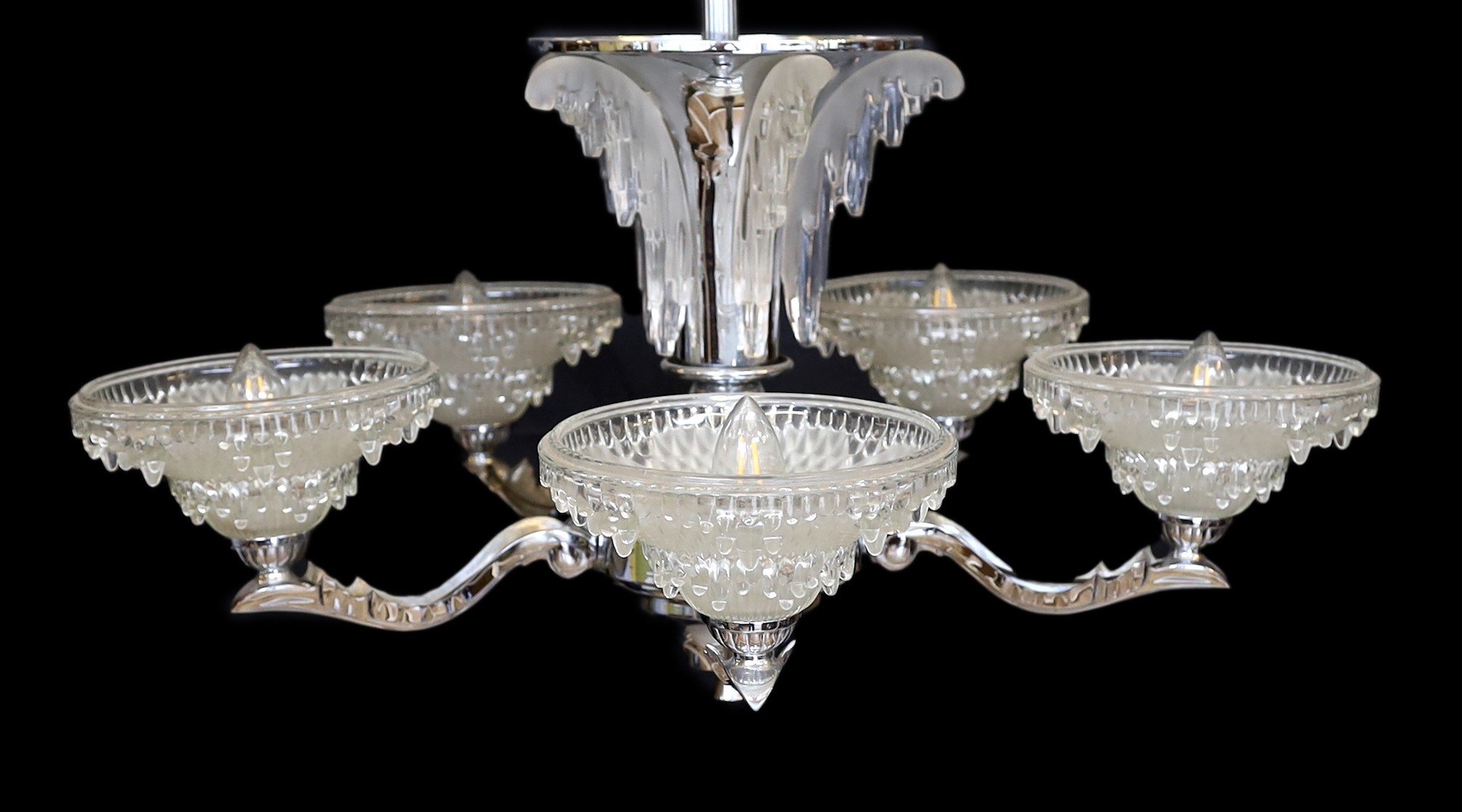 A French Art Deco chrome plated and glass five light chandelier, with scrolling branches and '