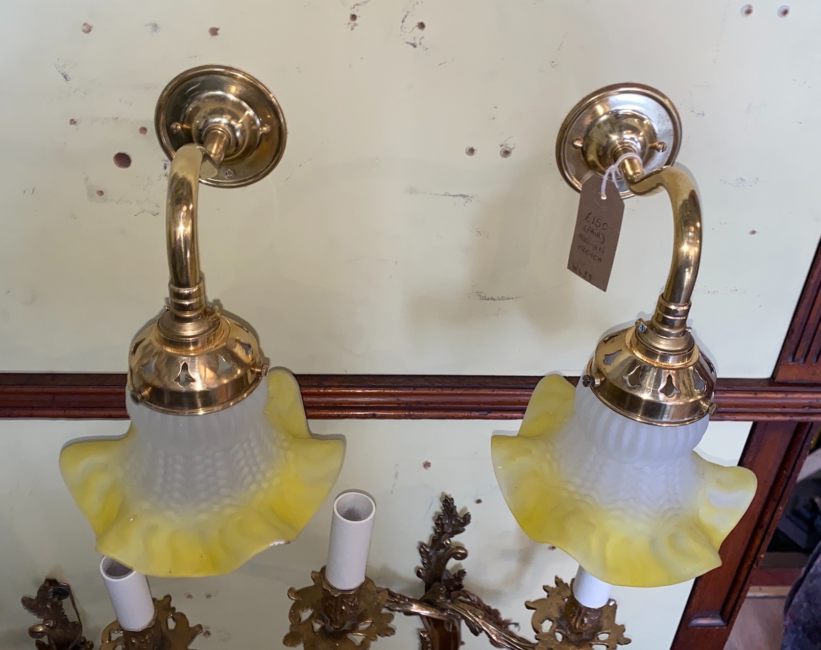A pair of 1930s French lacquered brass wall lights with yellow tinted quilted and frosted glass - Image 2 of 3