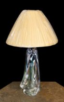 A 1960s Murano glass lamp base, of twisted form, with replacement pleated silk shade, height 38
