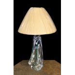 A 1960s Murano glass lamp base, of twisted form, with replacement pleated silk shade, height 38