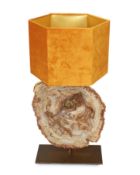 A bronze and petrified wood table lamp, height 60cm. width 28cm