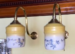 A pair of English brass gasolier wall lights with floral painted opaque wall glass shades, height