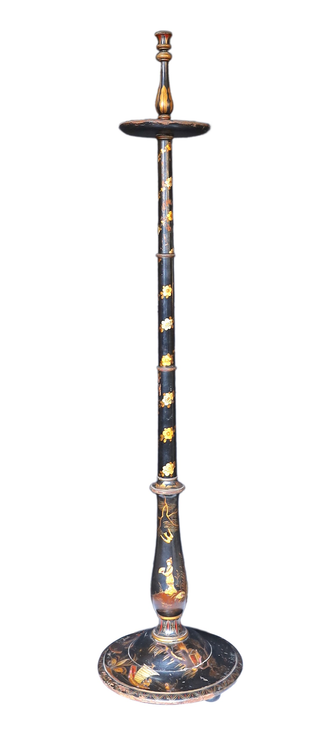 A 1920s English chinoiserie lacquered lamp standard, decorated with gilt figures in boats and