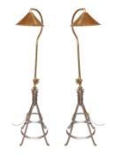 A pair of industrial style brass and wrought iron adjustable lamp standards, height 194cm. width