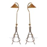 A pair of industrial style brass and wrought iron adjustable lamp standards, height 194cm. width